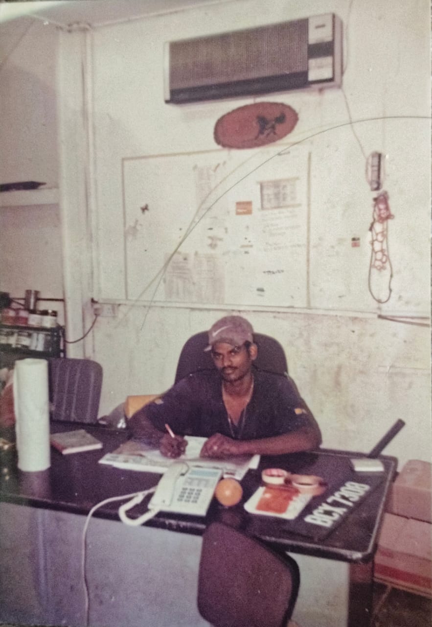 Kannan at his desk in the early days of the business